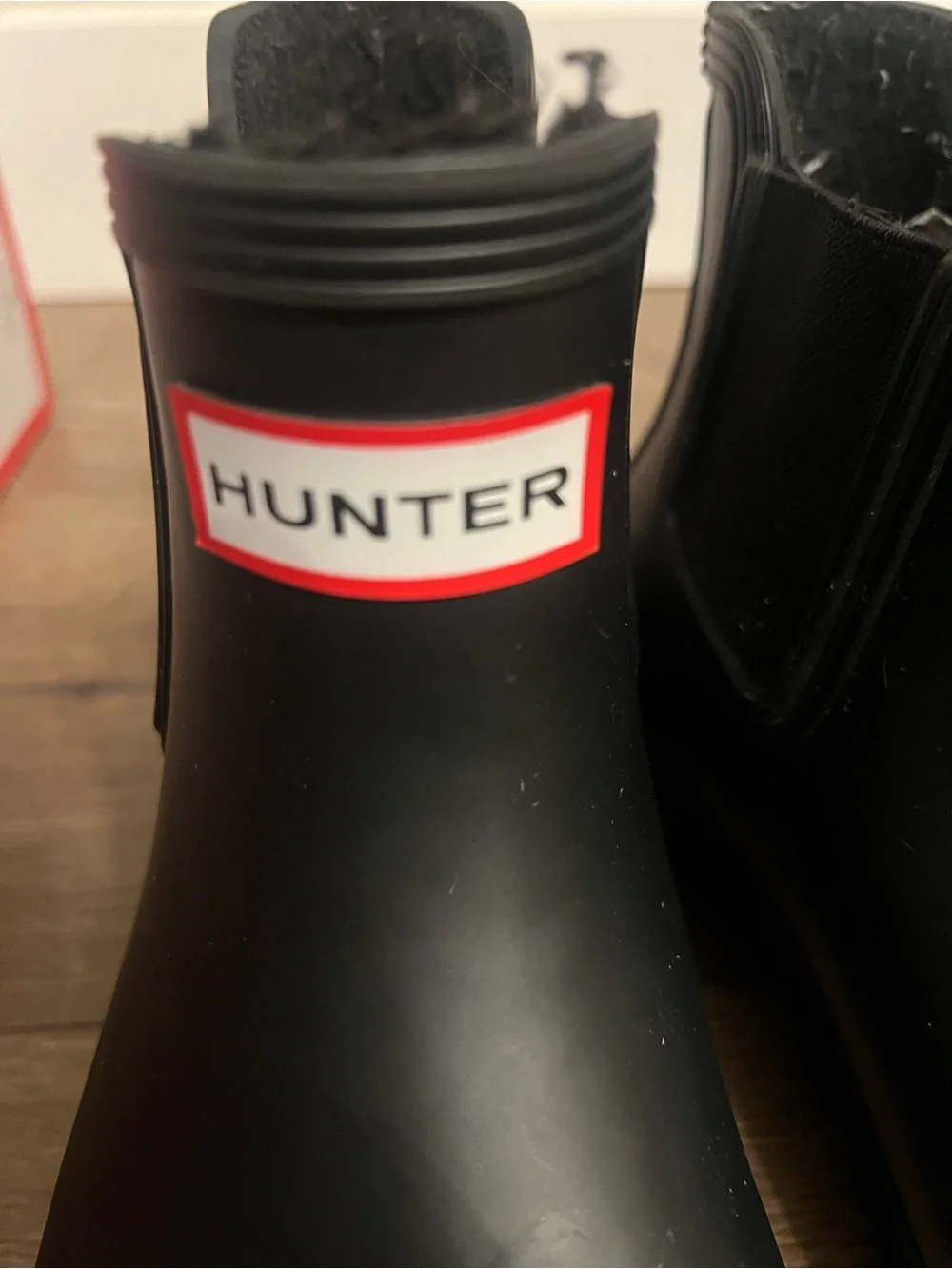 Hunter Women’s Black Chelsea Rain Boots with Red Logo